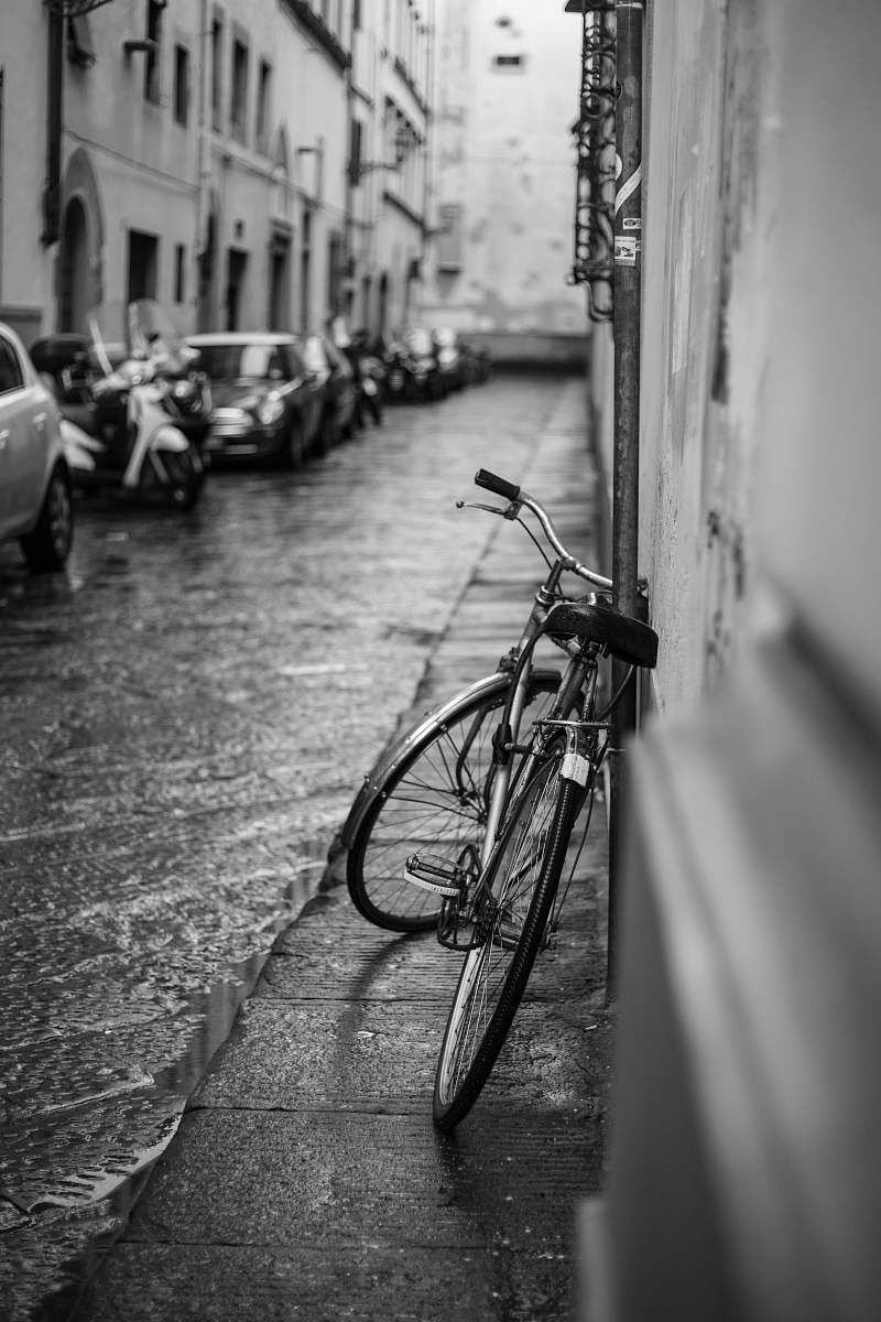 bicycle grayscale photo of bike on wall bike