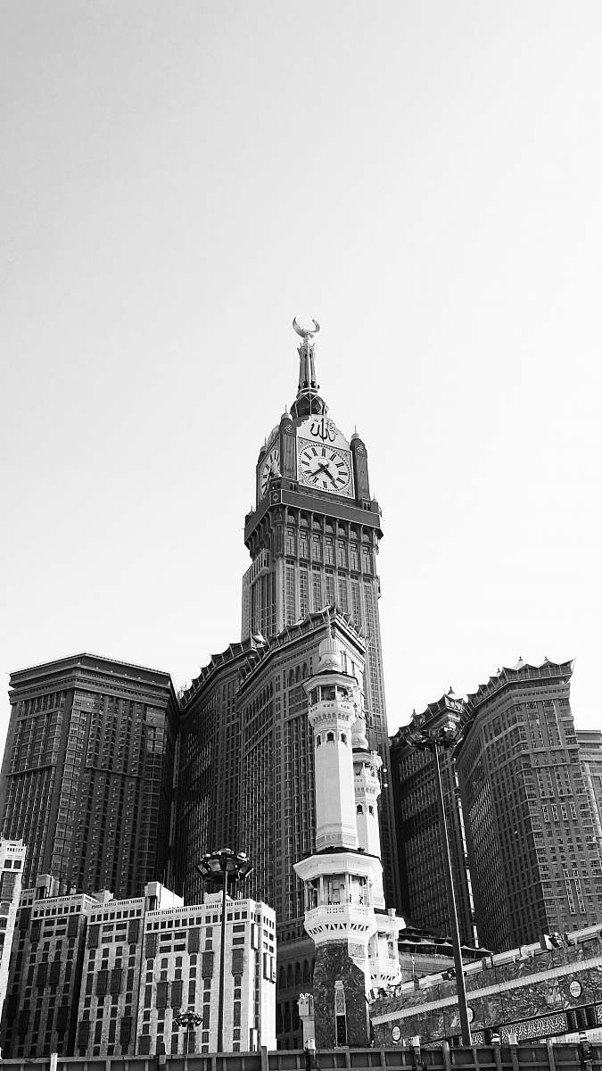 architecture grayscale photo of buildings and a tower tower