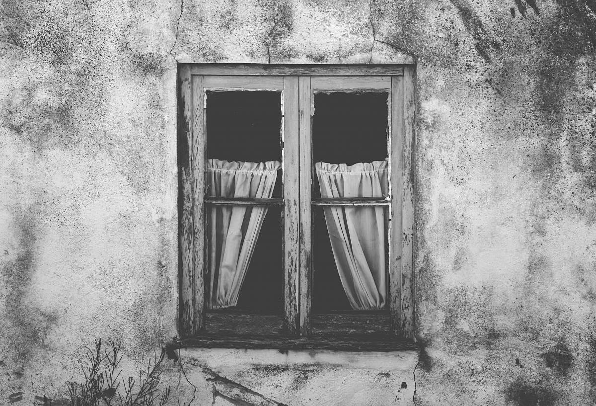 grey grayscale photo of closed window wall