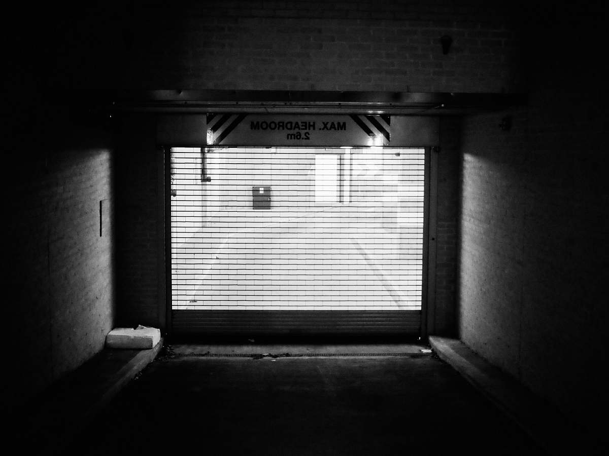 grey grayscale photo of garage door canning town
