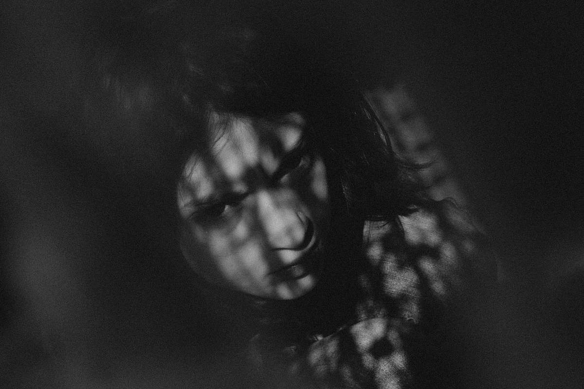 human grayscale photo of girl face