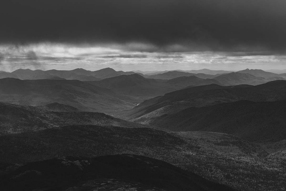 grey grayscale photo of hill and cloud horizon mountain