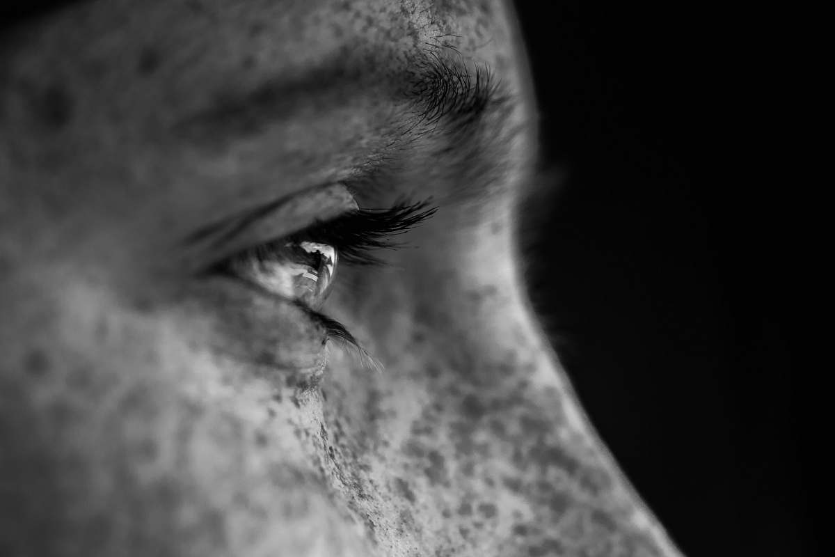 grey grayscale photo of man face face