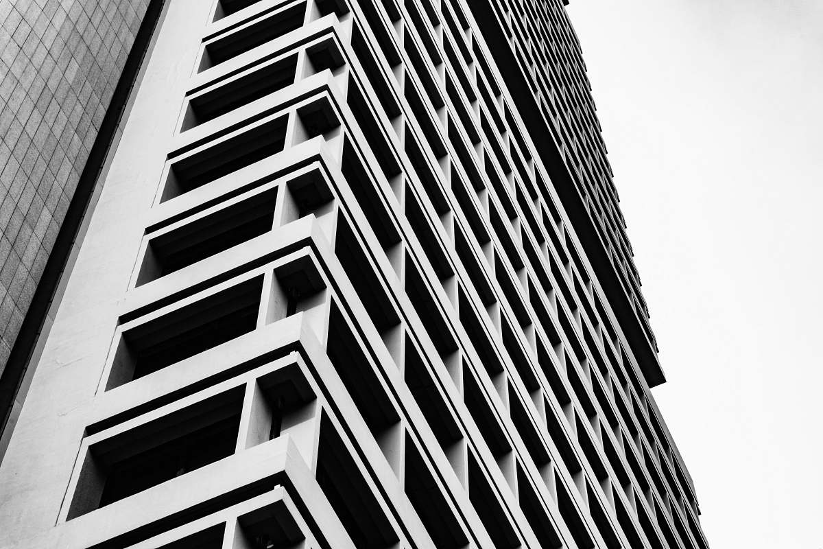 black grayscale photo of multi-storey building building