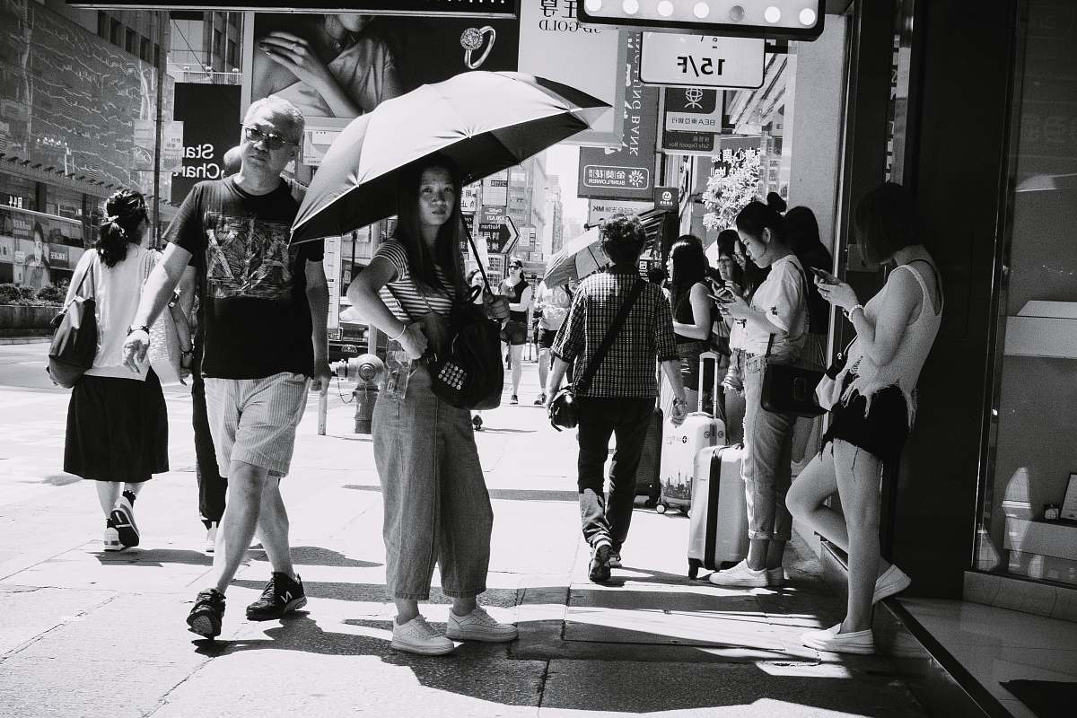 apparel grayscale photo of people in street shoe