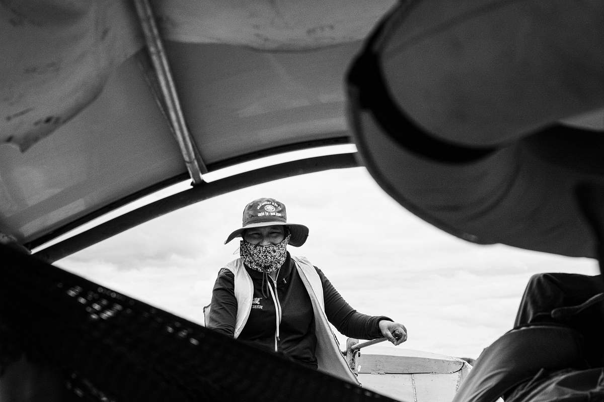 apparel grayscale photo of person near vehicle clothing