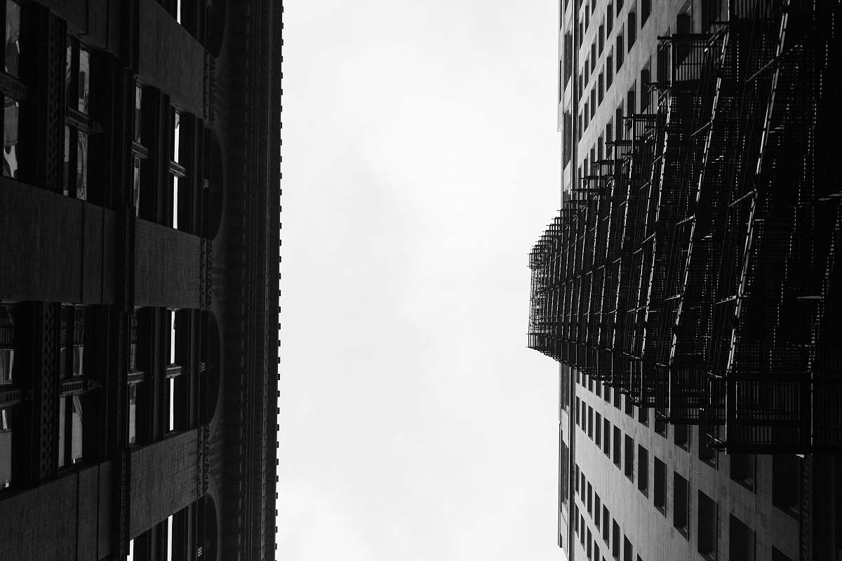 city grayscale photo of tower building building