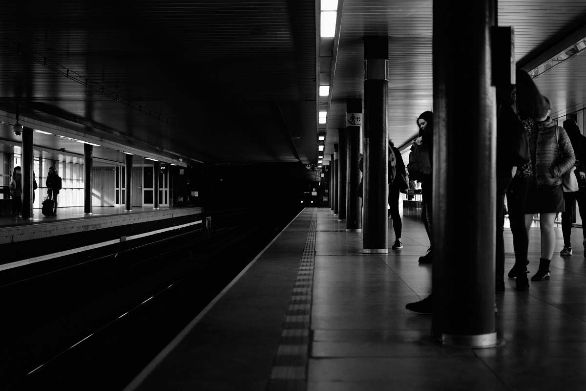 transportation grayscale photo of train station subway