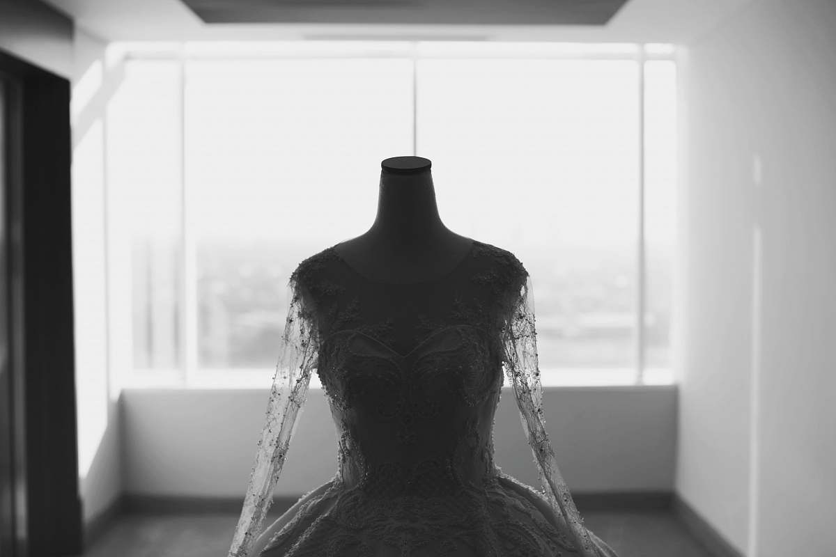 back grayscale photo of wedding dress mannequin