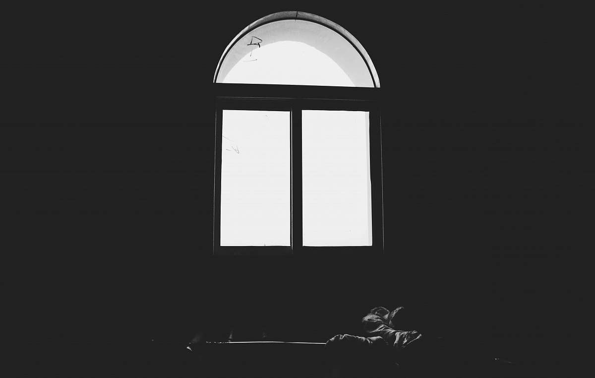 white grayscale photo of windows window