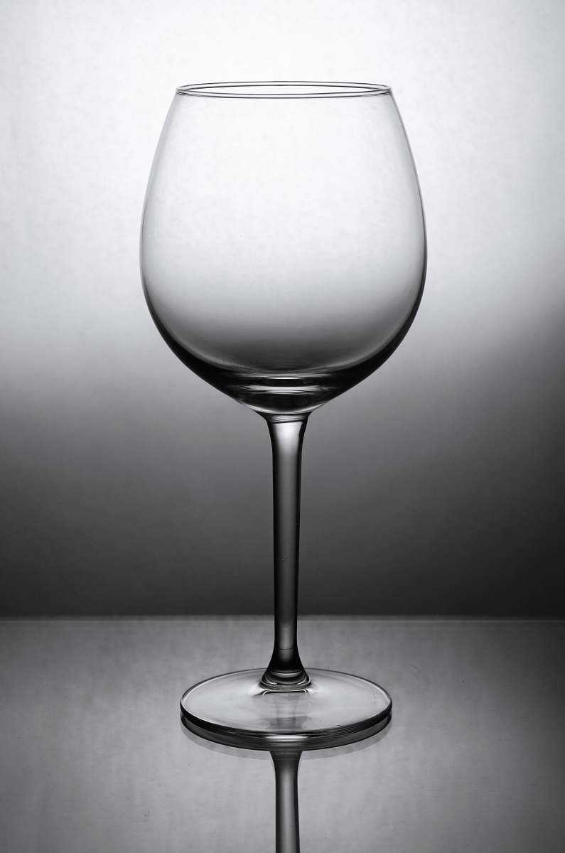 glass grayscale photo of wine glass wine