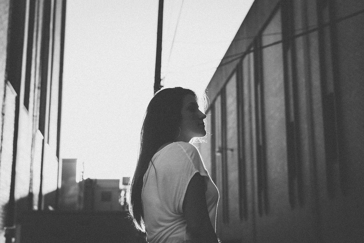 girl grayscale photo of woman facing right bw