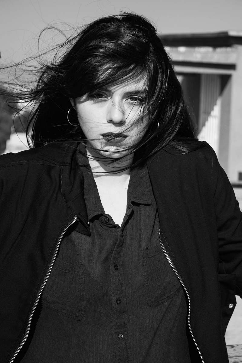 apparel grayscale photo of woman in full-zip jacket clothing