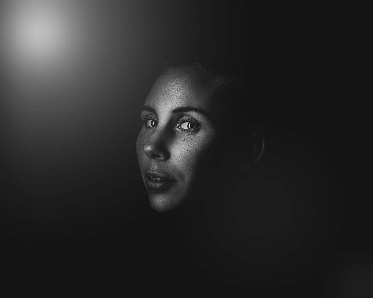 face grayscale photo of woman's face portrait