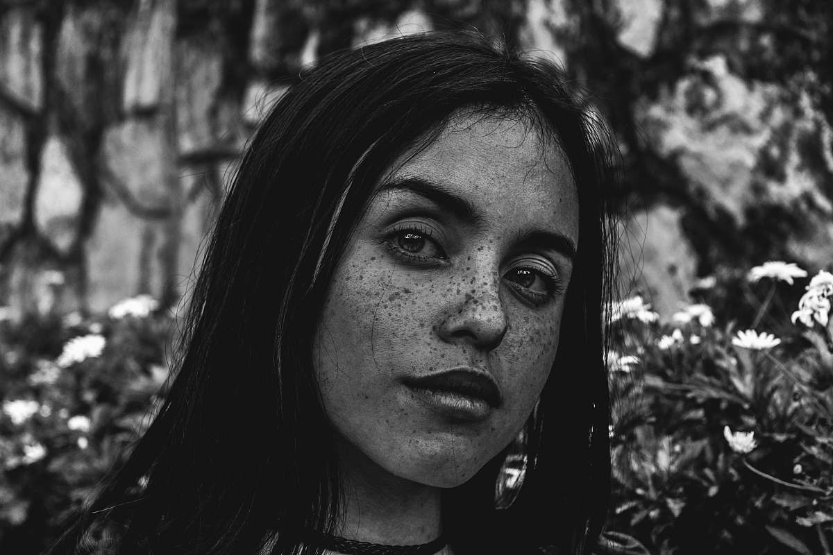 person grayscale photo of woman's face people