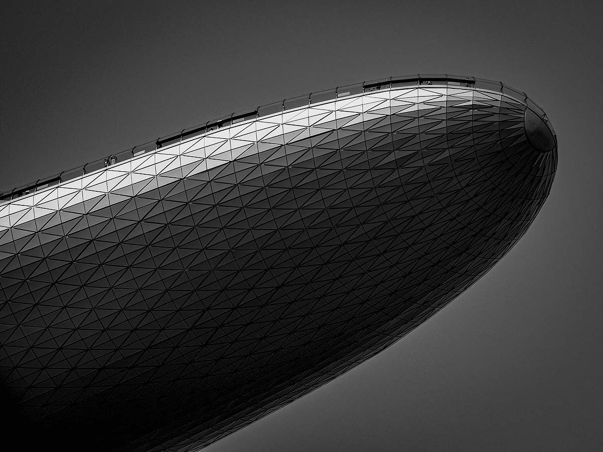 building grayscale photography of a blimp office building