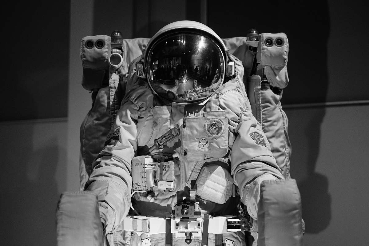 astronaut grayscale photography of astronaut space