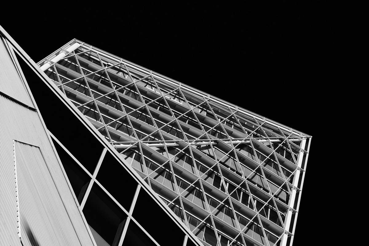 architecture grayscale photography of building triangle