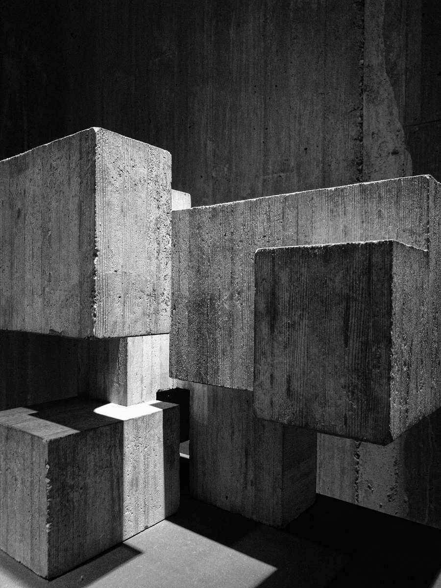 concrete grayscale photography of concrete blocks building
