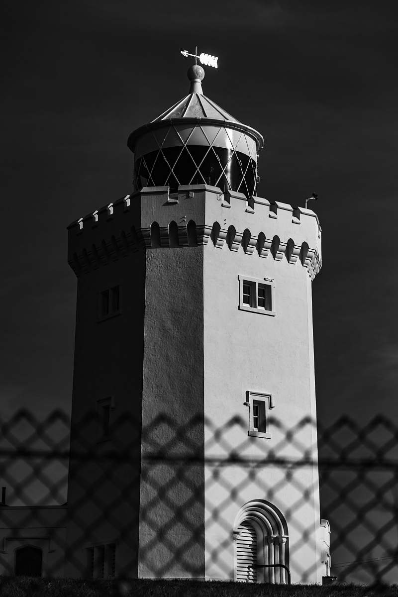 architecture grayscale photography of concrete tower building