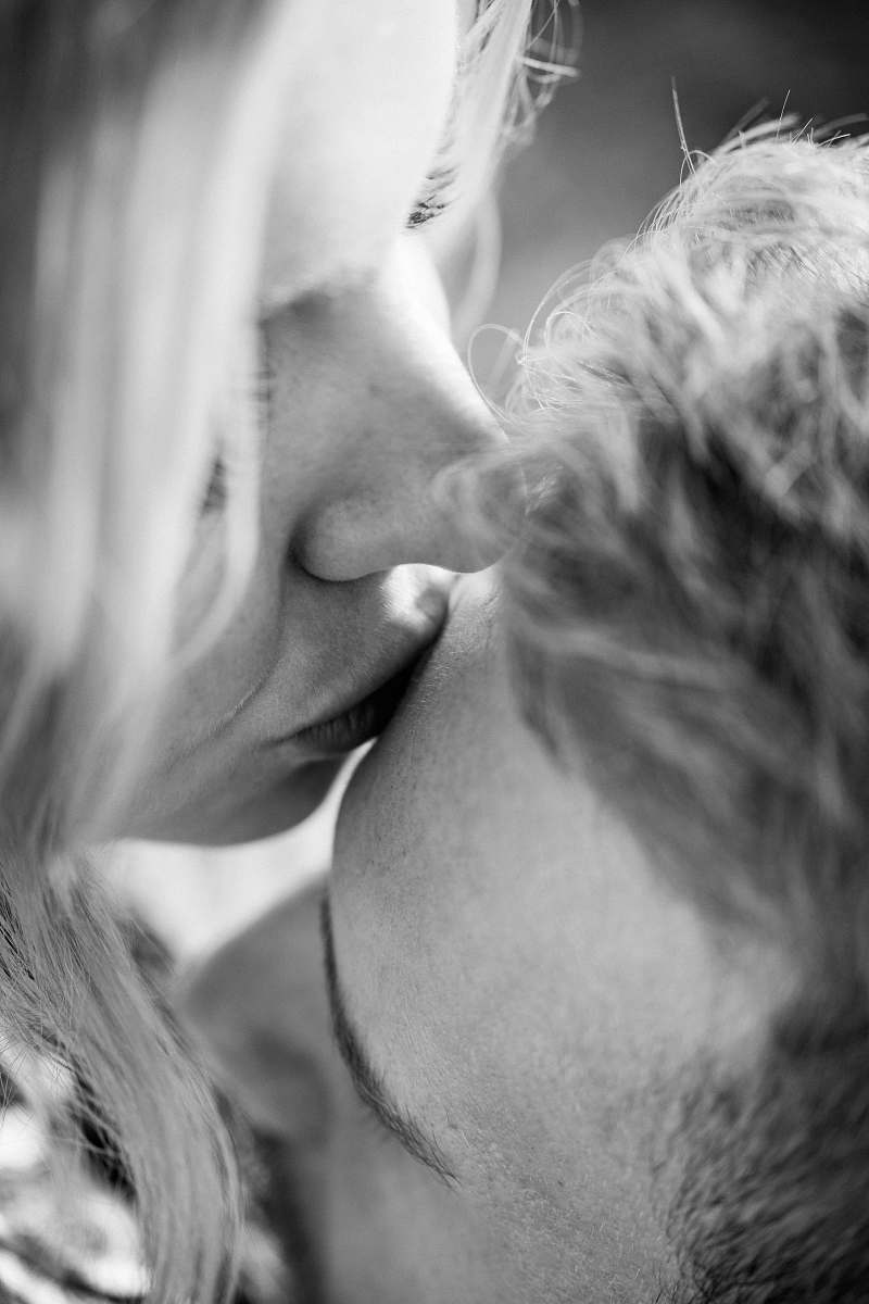 grey grayscale photography of couple kiss