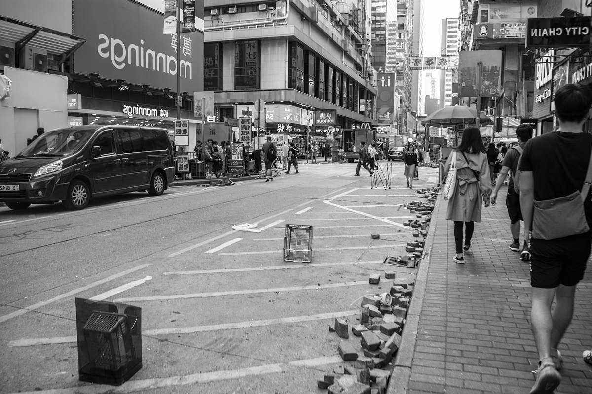human grayscale photography of crowd walking at sidewalk pedestrian