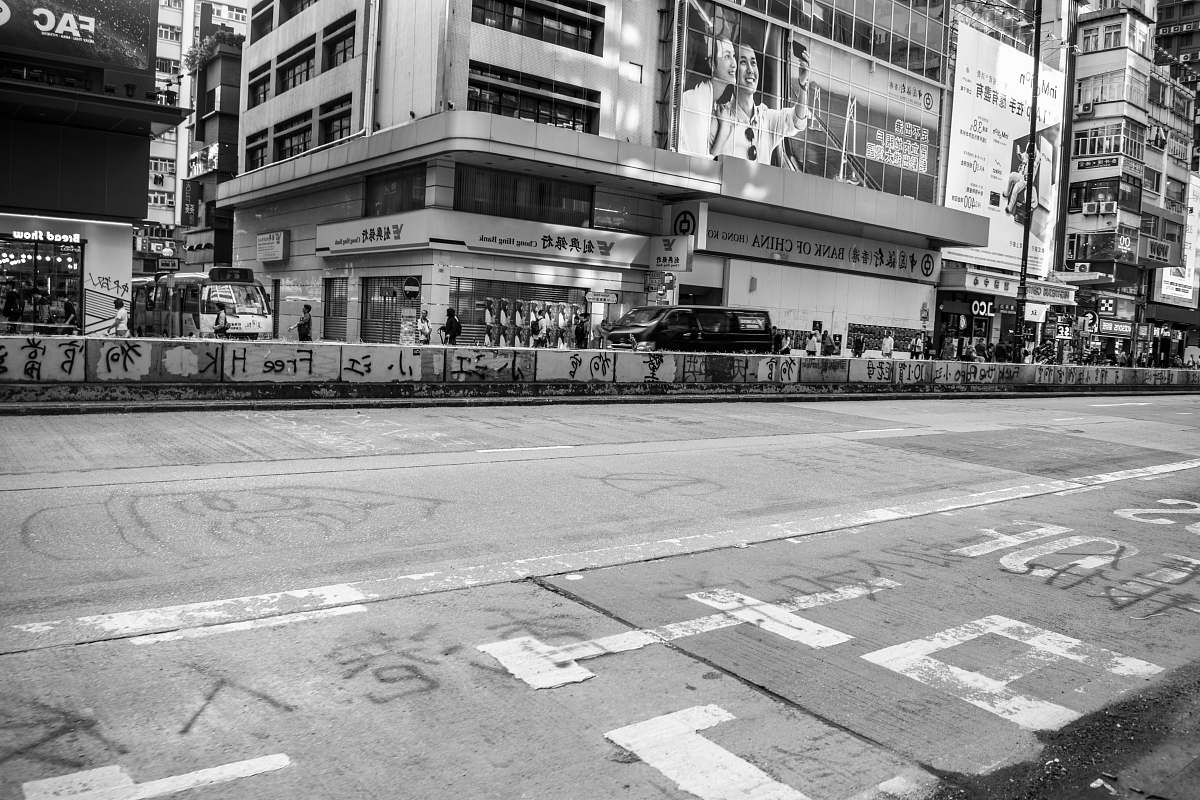 road grayscale photography of empty road during daytime asphalt