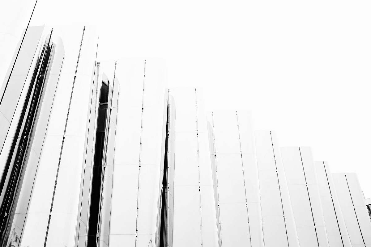 architecture grayscale photography of fence building