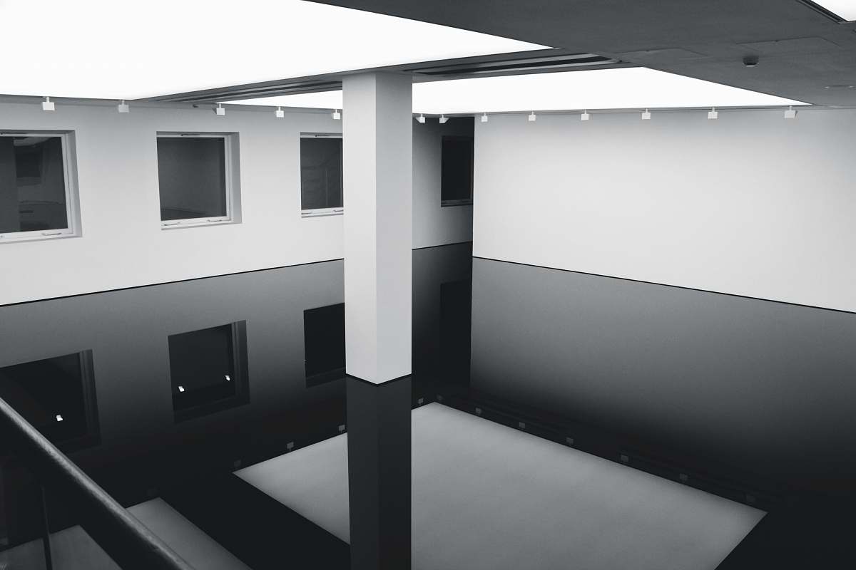 grey grayscale photography of inside building view lighting