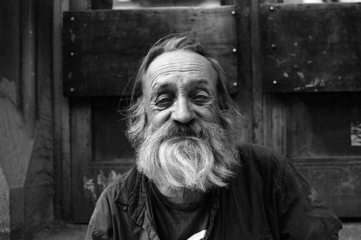 human grayscale photography of man's portrait person