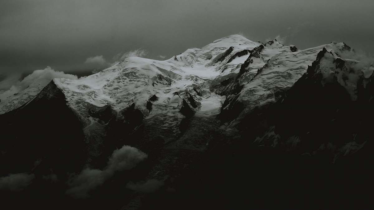 nature grayscale photography of mountain range mountain