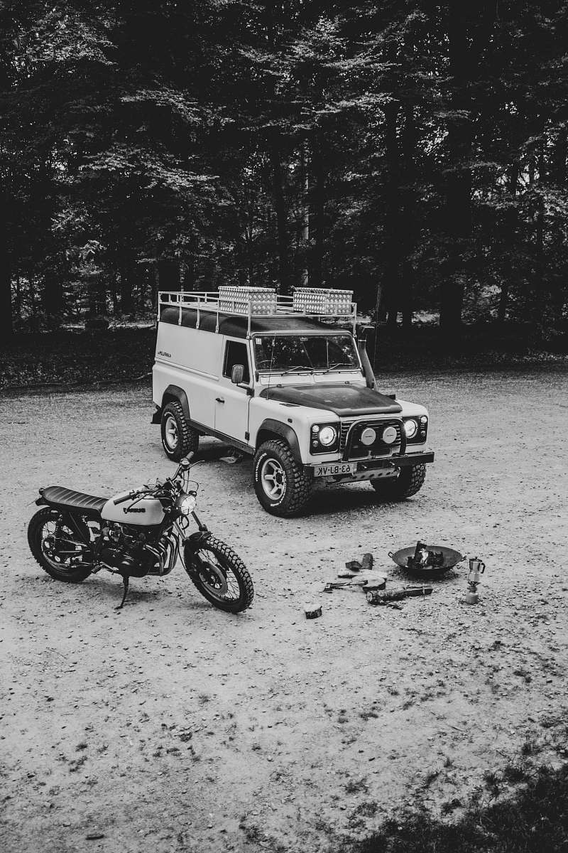 motorcycle grayscale photography of SUV and motorcycle transportation