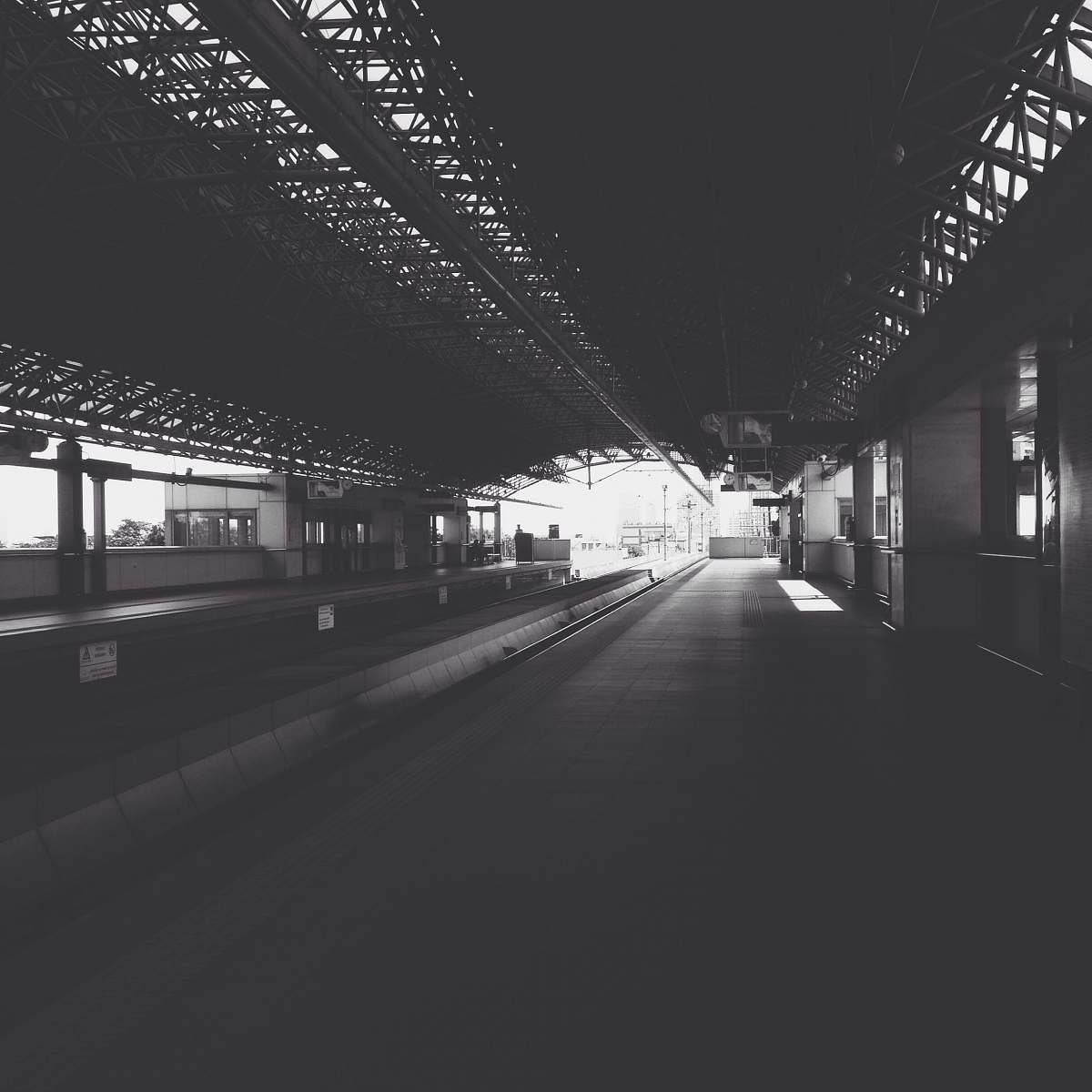 empty grayscale photography of train railway train