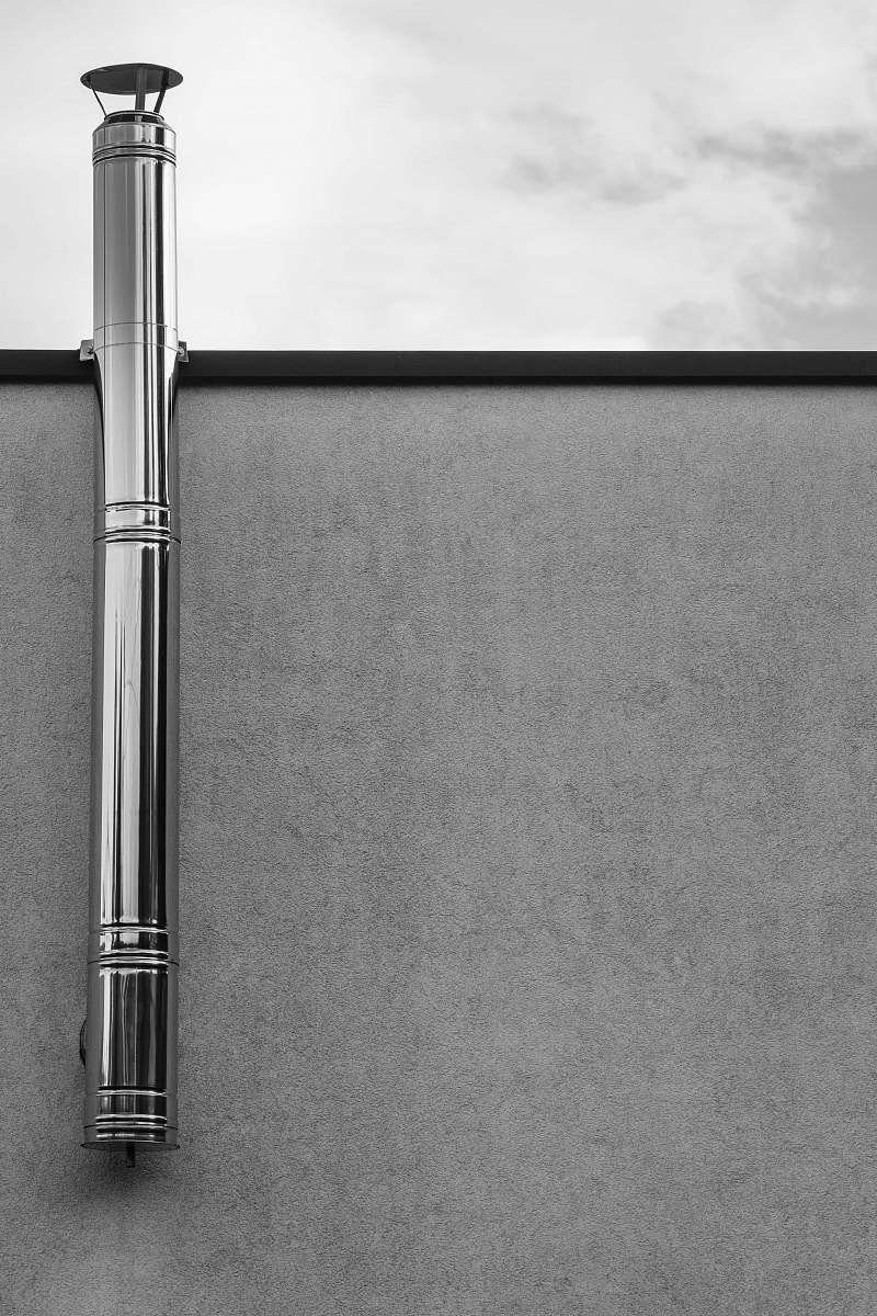 pipe grayscale photography of tube chimney