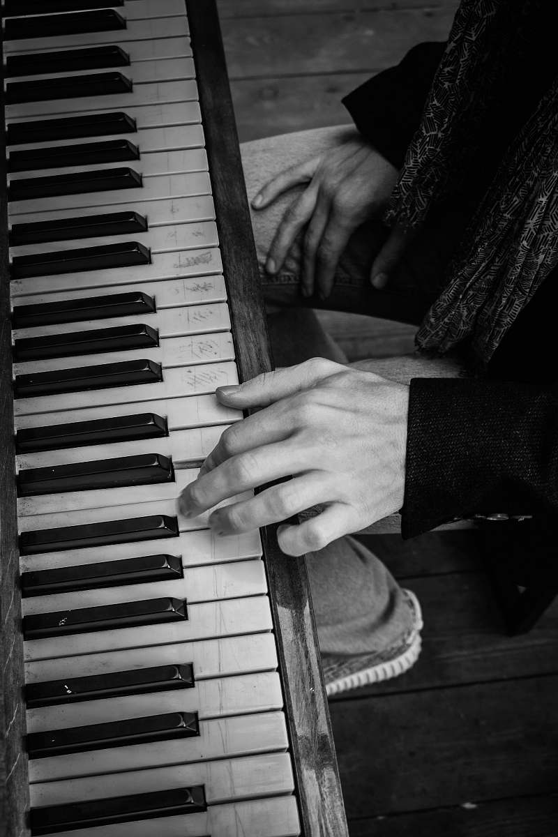 grey grayscale photography of upright piano electronics
