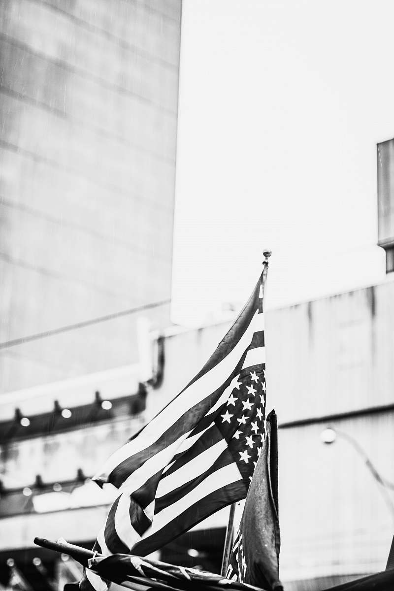 toronto grayscale photography of US flag canada