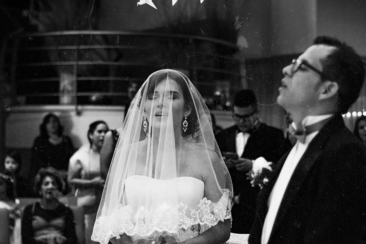 people grayscale photography of wedding coupe human
