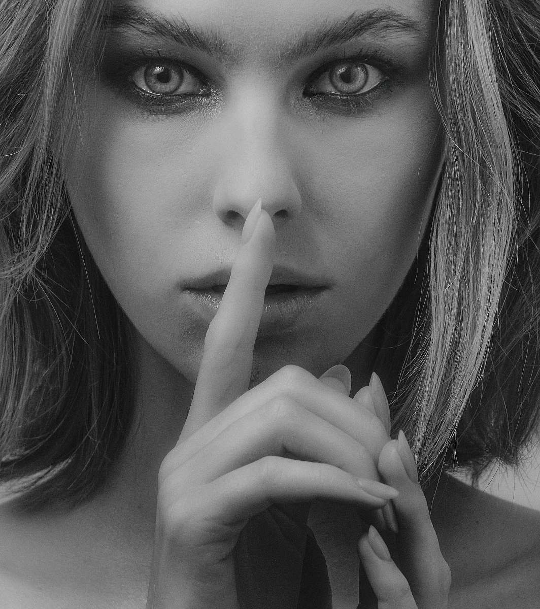 human grayscale photography of woman doing silent sign person