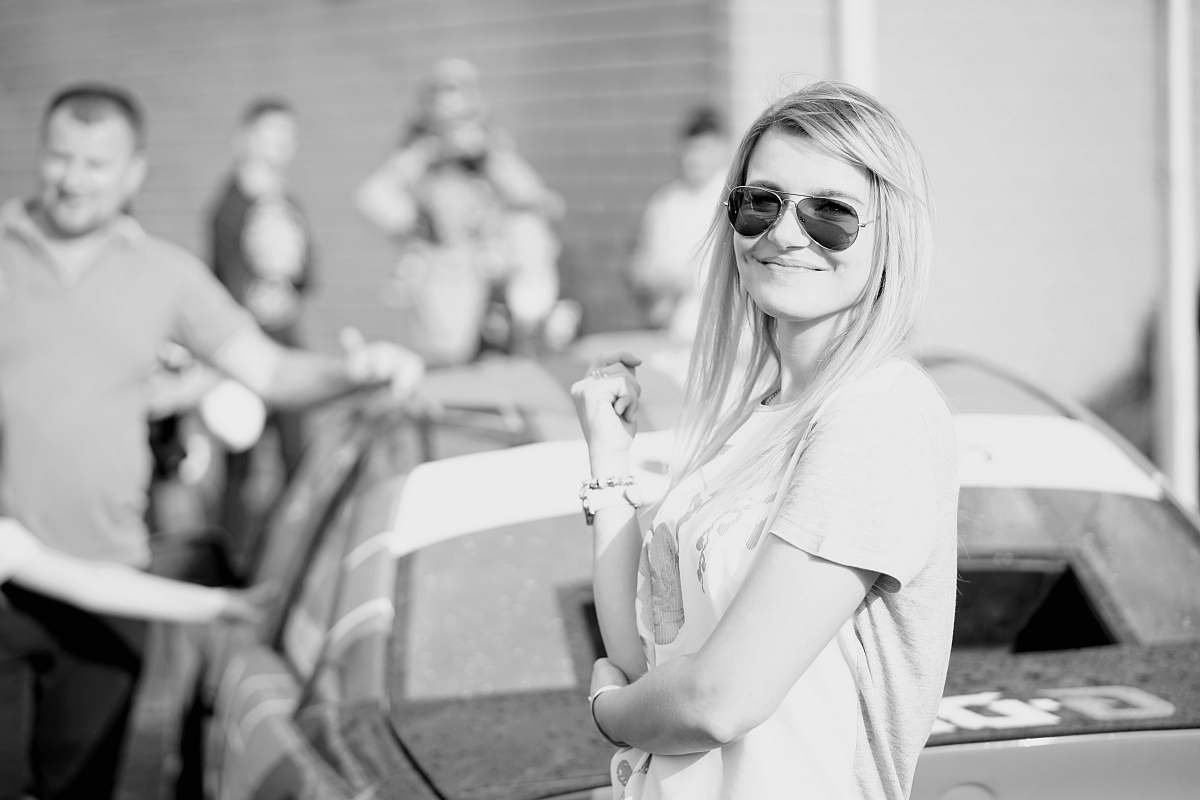 grey grayscale photography of woman in t-shirt human