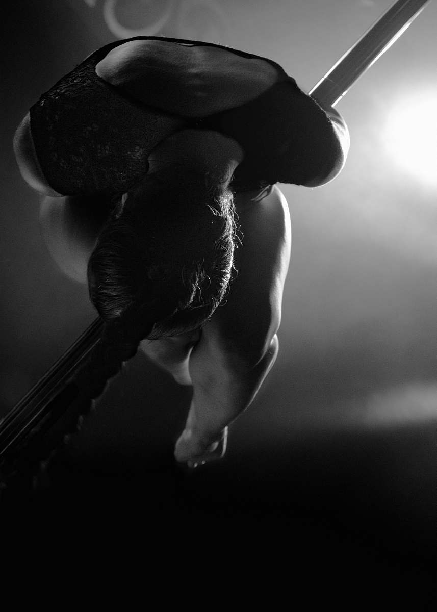 sport grayscale photography of woman pole dancing sports