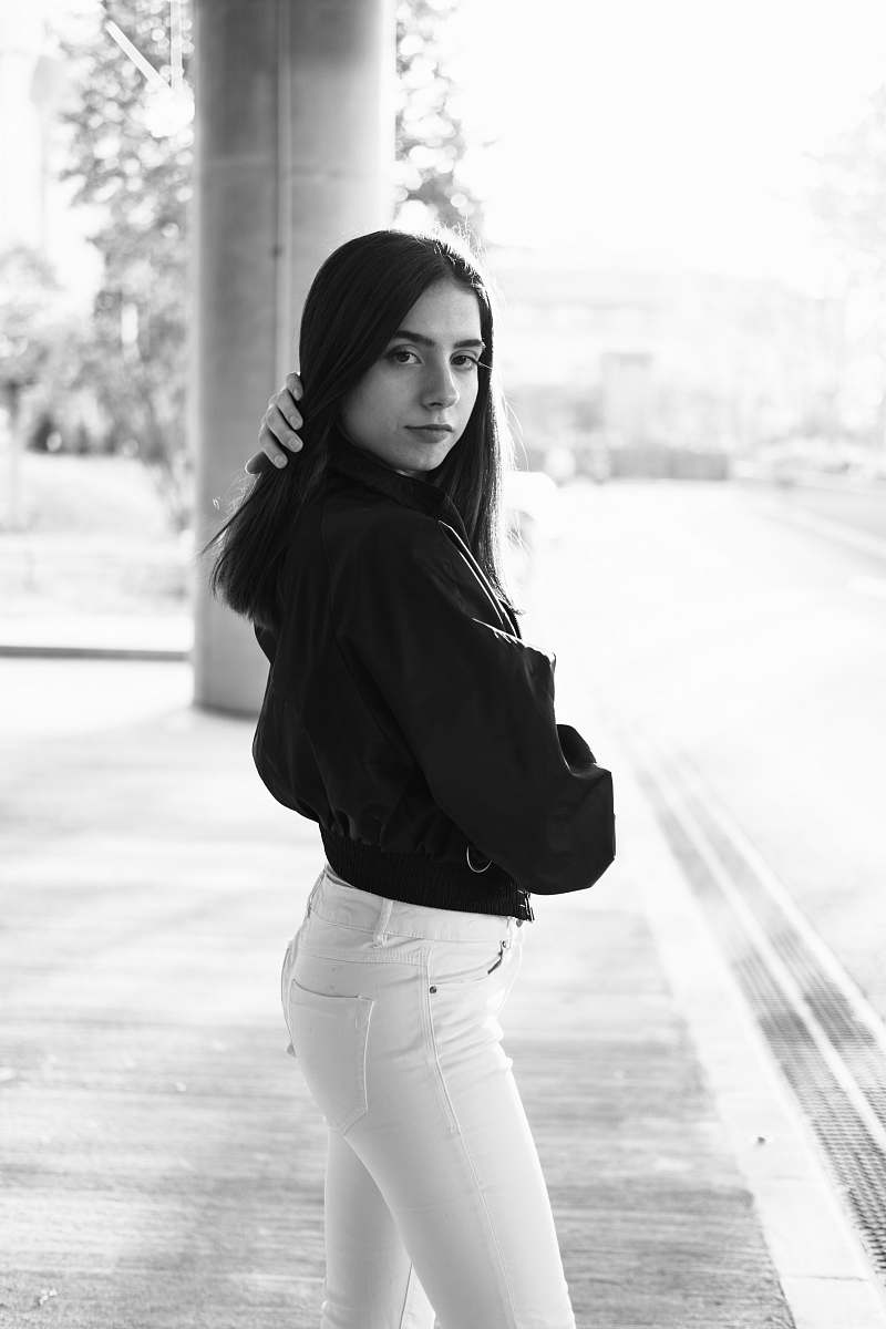 apparel grayscale photography of woman standing clothing