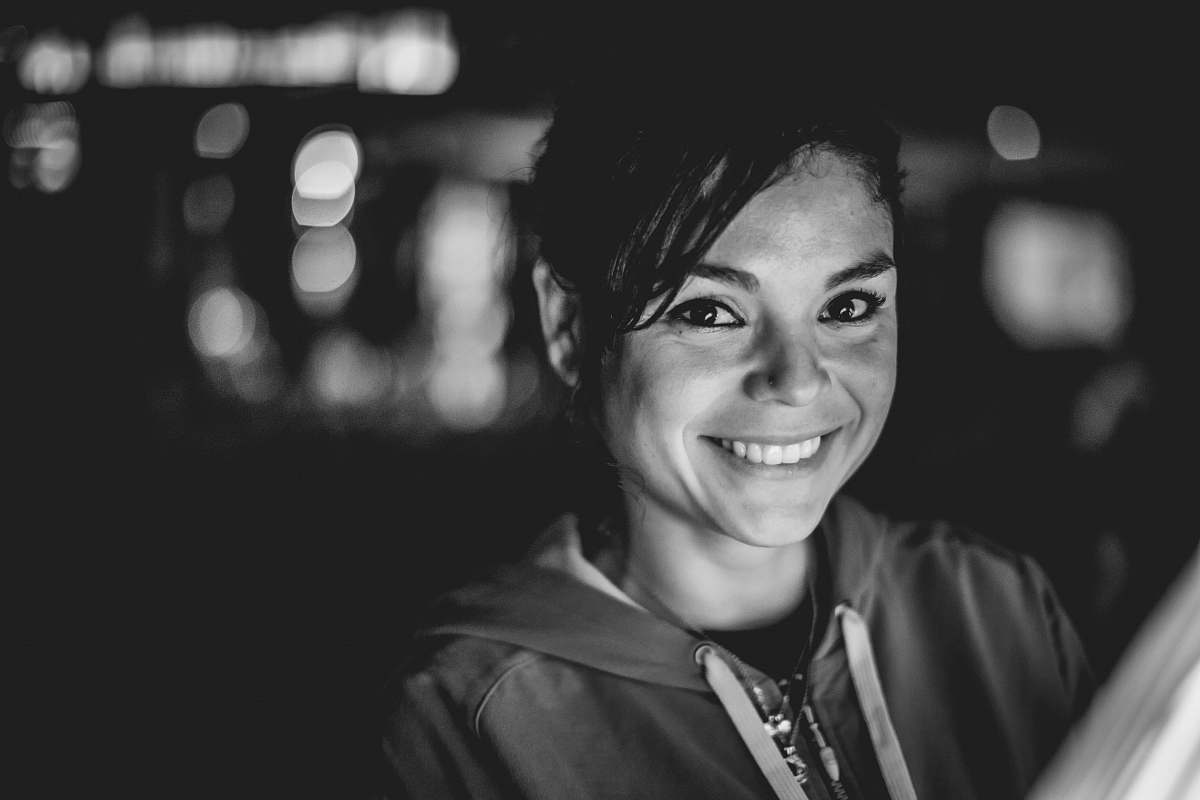 human grayscale photography of woman wearing top people