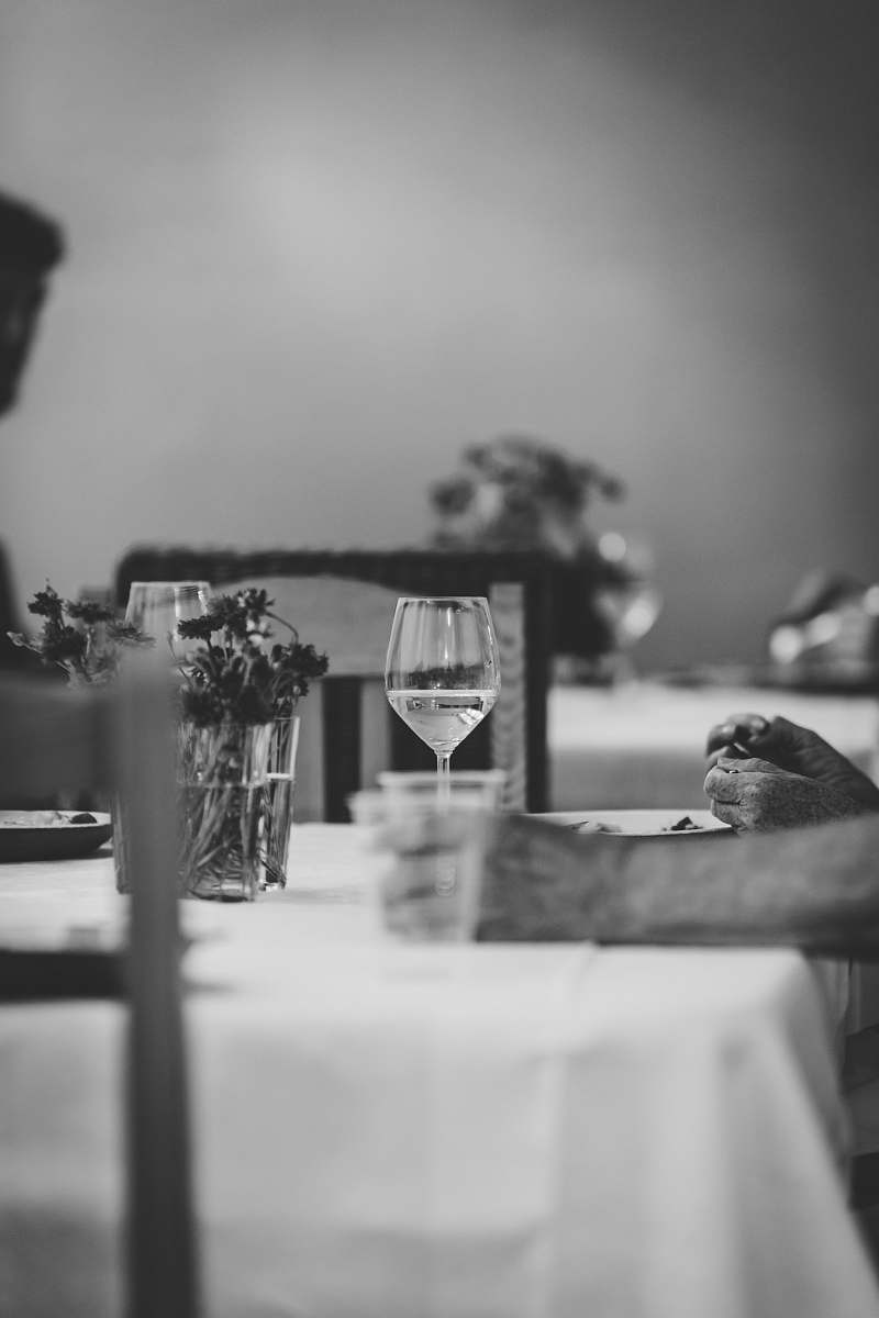 grey grayscale photography wine glass on top of table goblet