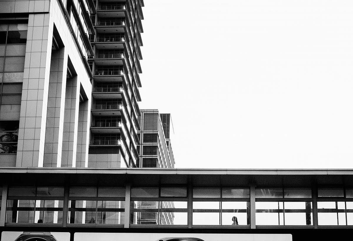 building greyscale photo of building city