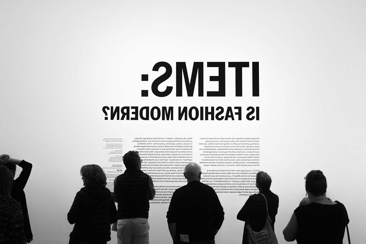 human Items: is fashion modern? text overlay person