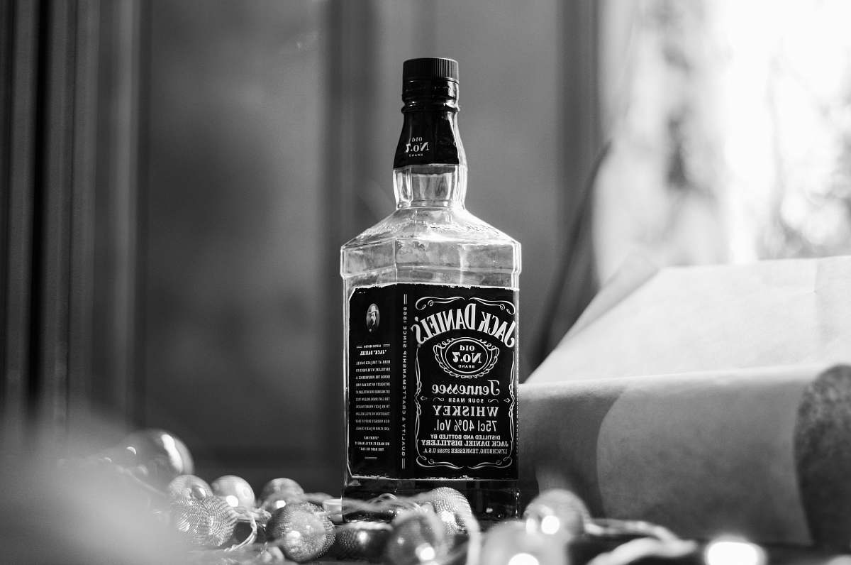 drink Jack Daniel's Tennessee whisky bottle near window alcohol