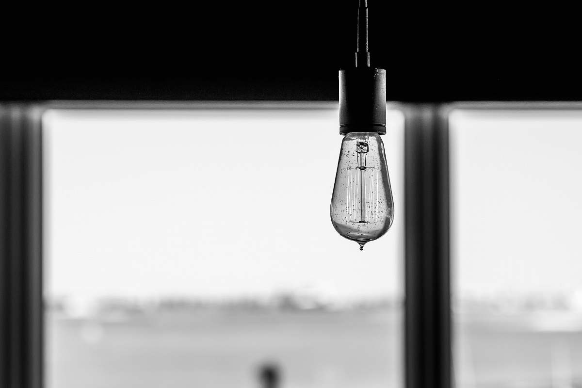 light light bulb handing on ceiling lightbulb
