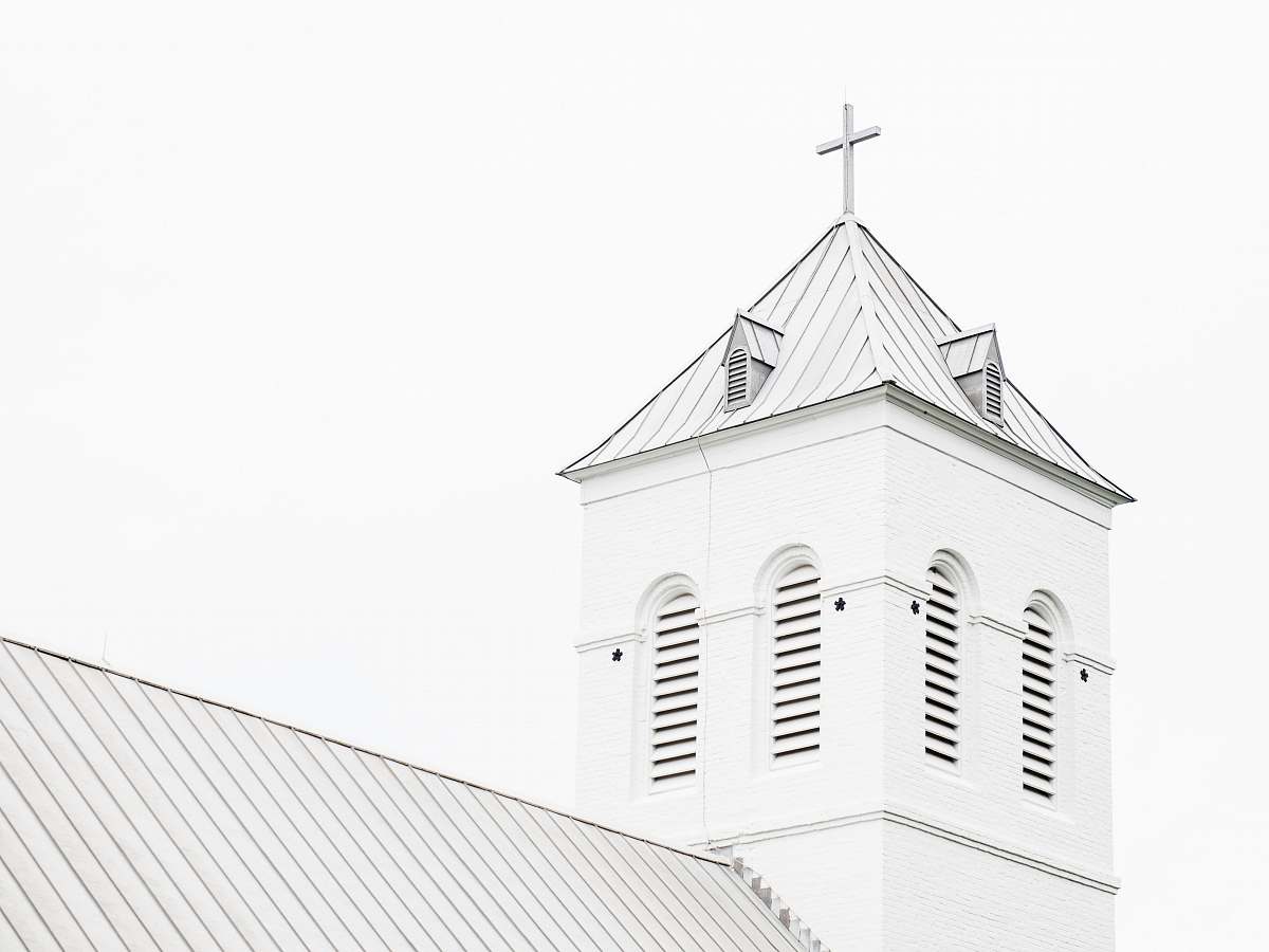 building low angle photo of white church church