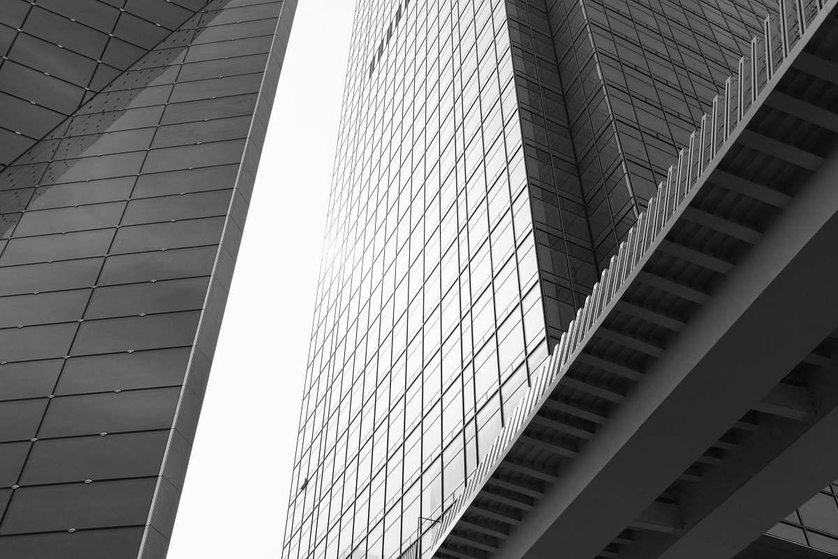 building low angle photography of glass curtain building office building