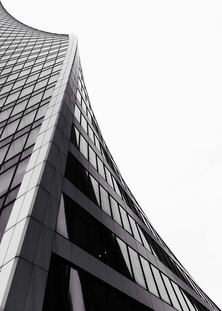 architecture low angle photography of grey high-rise building building